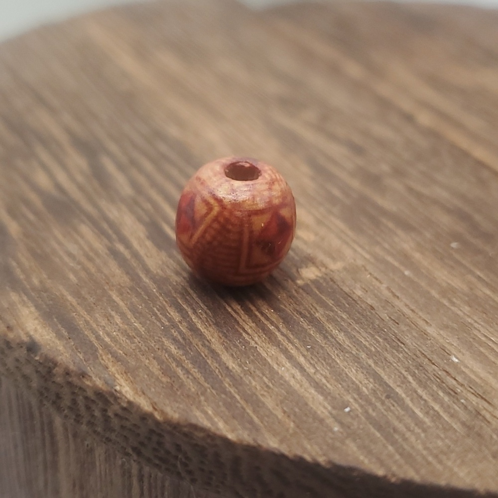 Tiki sunrise patterned bead charm‎